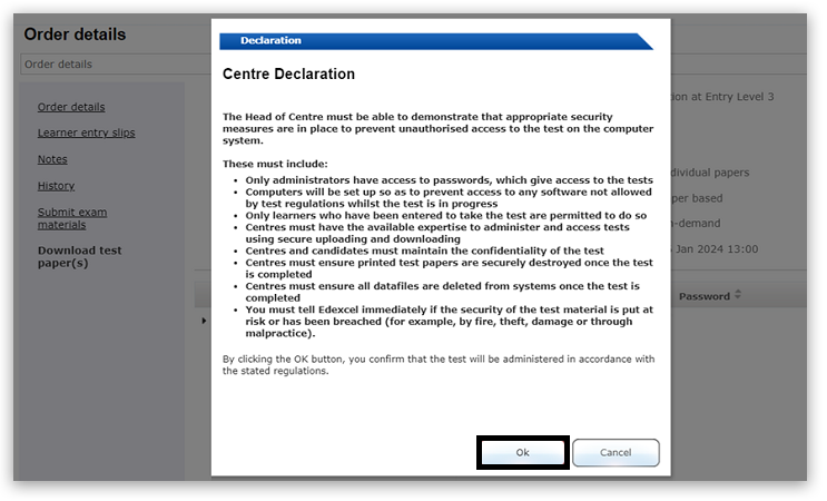 Pop-up titled 'Centre Declaration' outlines test security requirements. To confirm compliance, click the 'Ok' button—highlighted in a black box—at the bottom of the window. 'Cancel' is also available.